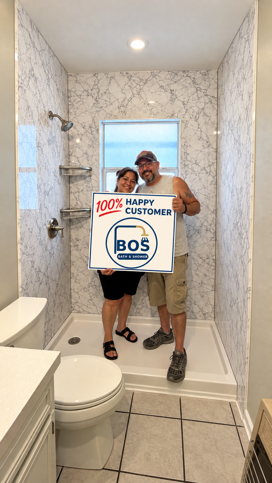Happy BOS Bath & Shower customers standing in their newly remodeled shower