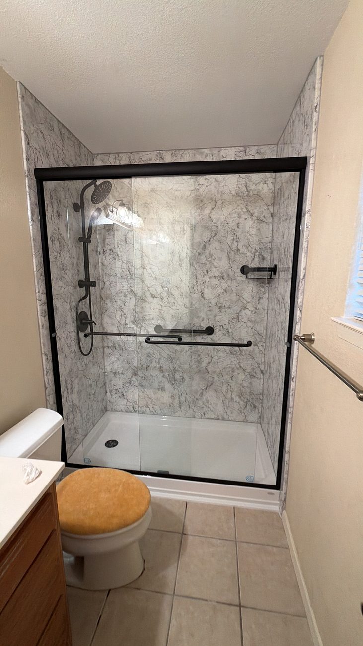Walk-in marble-look PVC shower